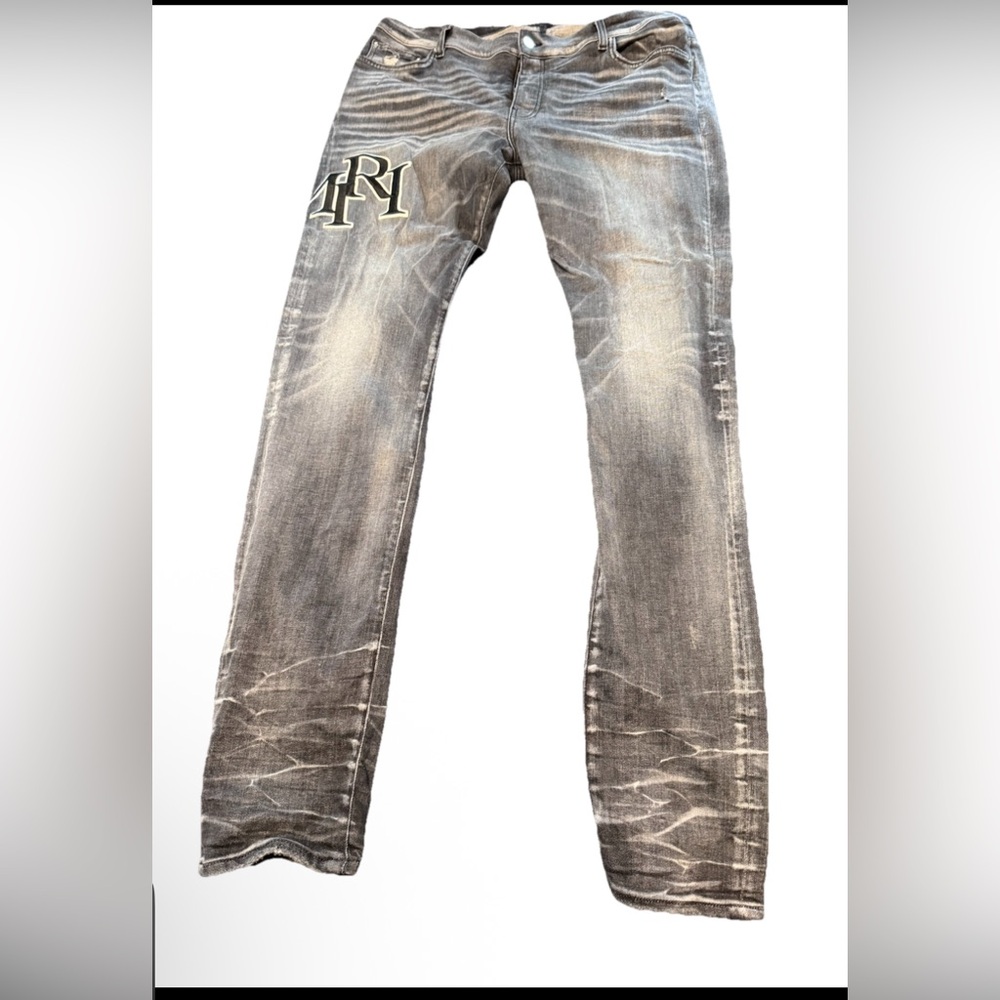 AMIRI Skinny Jeans with Distressed Details